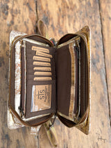 Photo of inside of metallic gold leather organization dividers and card slots